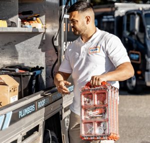 EKORP Plumbing technician carrying professional tools for general plumbing services in Sydney NSW